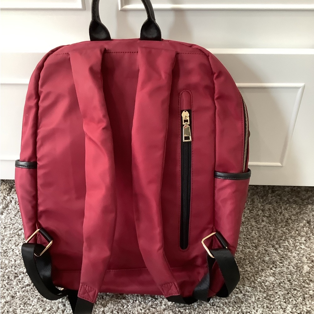 Closet Cleanout Sale! Modernist  Backpack identical to the Nordace Elle!!!
